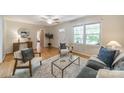 Cozy living room featuring hardwood floors, natural light, and stylish furnishings at 1188 Rainbow Cir, Catawba, SC 29704