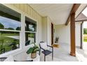 Cozy front porch featuring comfortable seating, a decorative rug, and a charming view of the surroundings at 181 Lone Pine Rd, Statesville, NC 28625
