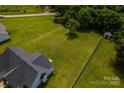 Spacious backyard perfect for outdoor activities, featuring a shed and lush green space at 1858 Brevard Place Rd, Iron Station, NC 28080