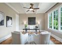Bright office space with coffered ceilings, natural light, and hardwood flooring at 3032 Kings Manor Dr, Matthews, NC 28104