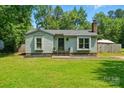 Single story house with a landscaped front yard at 6718 Pueblo Ln, Charlotte, NC 28227