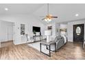 Bright living room featuring vaulted ceilings, modern furniture, and stylish decor at 1377 Beagle Run, Salisbury, NC 28146