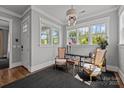 Cozy sitting area with lots of natural light, neutral paint, and hardwood floors at 536 Spring Landing Dr, Rock Hill, SC 29730