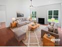 Bright living room boasting large windows and elegant neutral decor at 2479 N Legacy Park Blvd, Fort Mill, SC 29707