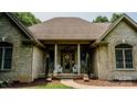 Inviting entrance featuring a walkway leading to the front door, and classic white brick architecture at 3273 16Th Ne St, Hickory, NC 28601