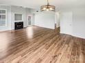 Spacious living room with fireplace and beautiful hardwood flooring at 3436 Ibis Ln, Fort Mill, SC 29707