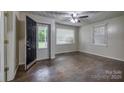 Spacious living room with hardwood floors, open layout, and plenty of natural light at 1036 20Th Ne St, Hickory, NC 28601