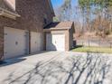 This home features a detached garage with three bays, and a spacious driveway at 2785 Disney Pl, Indian Land, SC 29707