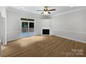 Bright living room with a fireplace and sliding doors to the outdoor space at 3104 Doncaster Dr, Rock Hill, SC 29732