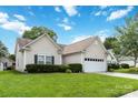 Lovely single-story home with well-kept lawn, vinyl siding, and attached garage at 6303 Trevor Simpson Dr, Indian Trail, NC 28079