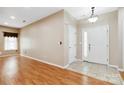Inviting foyer with tile flooring, neutral paint, and natural light streaming in at 6303 Trevor Simpson Dr, Indian Trail, NC 28079