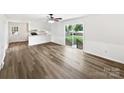 Bright living room featuring modern decor and a sliding door to the backyard at 1224 Bethlehem Rd, Kings Mountain, NC 28086