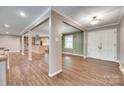 Open floor plan showcasing living area with hardwood floors and views to the kitchen at 257 Amity Dr, York, SC 29745