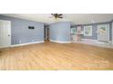 A spacious living room area featuring hardwood flooring and neutral-colored walls at 103 Sycamore Rd, Salisbury, NC 28147
