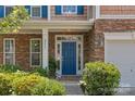 Close-up of the front door, showcasing stone details, landscaping, and a welcoming entrance at 2233 Sonoma Valley Dr, Charlotte, NC 28214