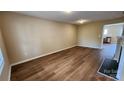 Large, unfurnished living room with hardwood floors, recessed lighting, and an open floor plan at 3208 Barons Court Rd, Charlotte, NC 28213