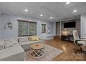 Comfortable living room with hardwood floors and a decorative ceiling, perfect for relaxing or entertaining at 4043 Windward Dr, Fort Mill, SC 29708