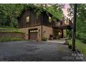 The house has a brick facade, a garage, and a balcony at 460 27Th Avenue Nw Cir, Hickory, NC 28601