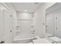 Full bathroom with a shower and tub combo, neutral walls, and a clean and functional layout at 741 Laguna Ave, York, SC 29745