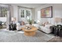 Bright living room with comfortable seating, large windows, and stylish decor at 2485 Hedgecliff Rd, Kannapolis, NC 28025