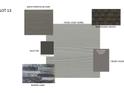 Sample of material selections including Pearl Gray siding, aged pewter accent, gauntlet gray front door, norris gray and weathered wood roofing at 4040 Grommet Ct, Matthews, NC 28105
