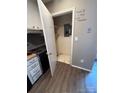 View of a storage space or pantry area, showcasing shelving and electrical panel access at 921 Nottingham Dr # 6, Gastonia, NC 28054
