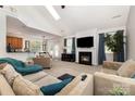 Bright and airy living room featuring a fireplace, neutral decor, and comfortable seating at 9814 Tompkins Ln, Waxhaw, NC 28173