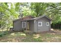 Single-story home with a covered porch, perfect for outdoor relaxation at 1216 Mountain Ave, Gastonia, NC 28052
