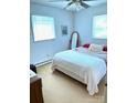 Bright bedroom with a comfortable bed and ample natural light from the windows at 1460 Legion Rd, Fort Mill, SC 29715