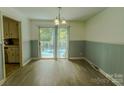 Bright dining room with sliding glass doors leading to a deck, perfect for entertaining at 1867 Shannon Dr, Conover, NC 28613