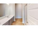The bathroom features gray cabinets, a shower with glass doors, and hard surface floors at 2547 Ruby Dixon Crossing Dr # 17, Gastonia, NC 28056