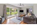 Bright living room with bay window and comfortable seating at 505 Melody Ln, Shelby, NC 28152