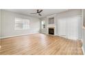 Spacious living room with fireplace and natural light at 9630 Turning Wheel Dr, Charlotte, NC 28214