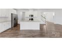 Modern kitchen with stainless steel appliances and granite countertops at 15208 Caspian Way, Charlotte, NC 28278