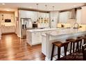 Spacious open kitchen with granite countertops, stainless steel appliances, and a large center island at 1868 Chestnut Hill Dr, Tega Cay, SC 29708