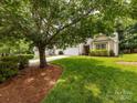 Well maintained lawn and mature trees frame the home at 3347 Xandra Ct, Indian Land, SC 29707
