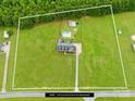 Expansive property with a charming home, pool, and outbuildings, all surrounded by mature trees at 106 Laren Rd, Shelby, NC 28152