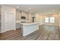 Stylish kitchen boasting a center island, stainless appliances, and ample counter space at 1205 Morehead Dr, Salisbury, NC 28144