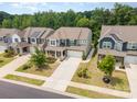Aerial view of a neighborhood showcasing a charming two-story home at 150 Haddonsfield Dr, Mooresville, NC 28115