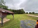 Expansive green lawn and surrounding trees at 200 Prospect Church Rd, Albemarle, NC 28001