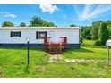 Charming home with a neatly paved walkway and cozy, inviting porch at 1016 S D Ave, Maiden, NC 28650