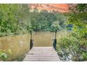 Private dock perfect for fishing and enjoying the serene waterfront views of the property at 1062 Willow Ridge Ln, Fort Mill, SC 29707