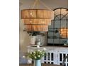 Cozy dining area with a decorative chandelier, modern furnishings, and natural light at 301 Supernova Dr, York, SC 29745