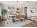 Cozy dining room featuring a coffered ceiling, buffet, and decorative lamps at 301 Supernova Dr, York, SC 29745
