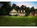 Inviting home featuring well-manicured landscaping and a classic facade, all nestled on a lush green lawn at 481 Evergreen Rd, Clover, SC 29710