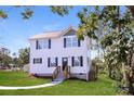 Charming two-story home with a well-manicured lawn, new walkway, and inviting front entrance at 515 Kings Mountain St, Clover, SC 29710
