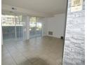 Spacious living room featuring sliding glass doors to the outside at 9501-A Shannon Green Dr, Charlotte, NC 28213