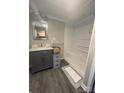 Well-lit bathroom featuring a vanity and shower at 15 Rose St, York, SC 29745