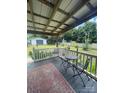 Relax on the porch with chairs and an outdoor view at 15 Rose St, York, SC 29745