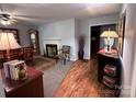 Inviting living room featuring a fireplace, classic décor and comfortable seating at 2405 Forrestbrook Dr, Kannapolis, NC 28083